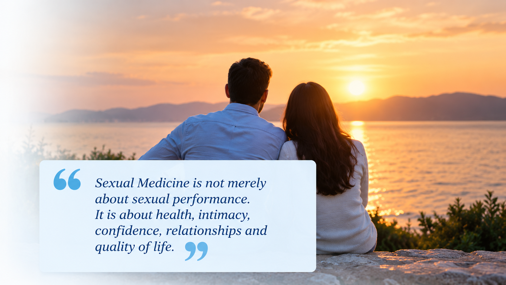 A couple sitting together at sunset